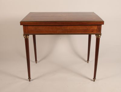 a small table with a drawer on the top of it