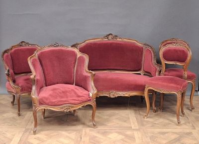 six chairs and a couch in a room
