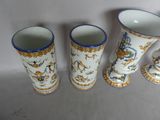 three vases sitting next to each other on a table