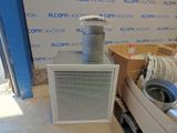 a small air conditioner sitting on top of a pallet