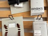 several different types of glasses are hanging on a rack