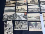 several old black and white photographs of people and buildings on a table