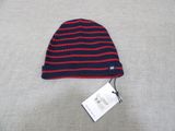 a red and blue striped hat with a tag on it