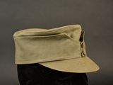 a close up of a hat on a mannequin head