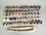 many different types of jewelry on the table