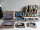 many boxes of different colors and designs on the table