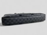 a black and grey checkered pencil case sitting on top of a white surface