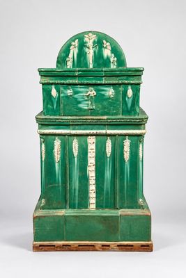 une image représentant un vase vert surmonté d'un dôme