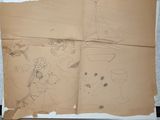 a piece of paper with drawings on it on a table