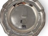an antique silver plate on a white background with a white background