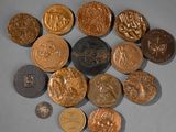 a lot of coins that are sitting on a table