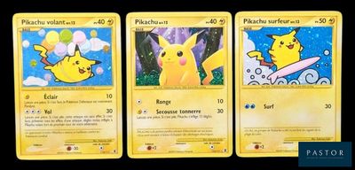 Trois cartes Pokémon sont représentées en ligne sur un fond noir