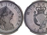 a close up of a coin with a woman ' s face on it