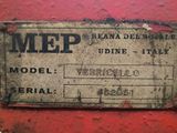 a sign on the side of a red truck