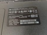 a close up of a laptop that has a sticker on it